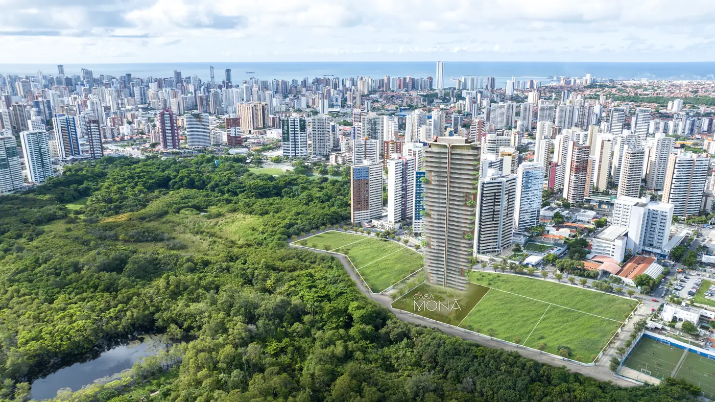 A mesma vista aérea com a torre da Casa Monã inserida no terreno, junto à mata do parque
